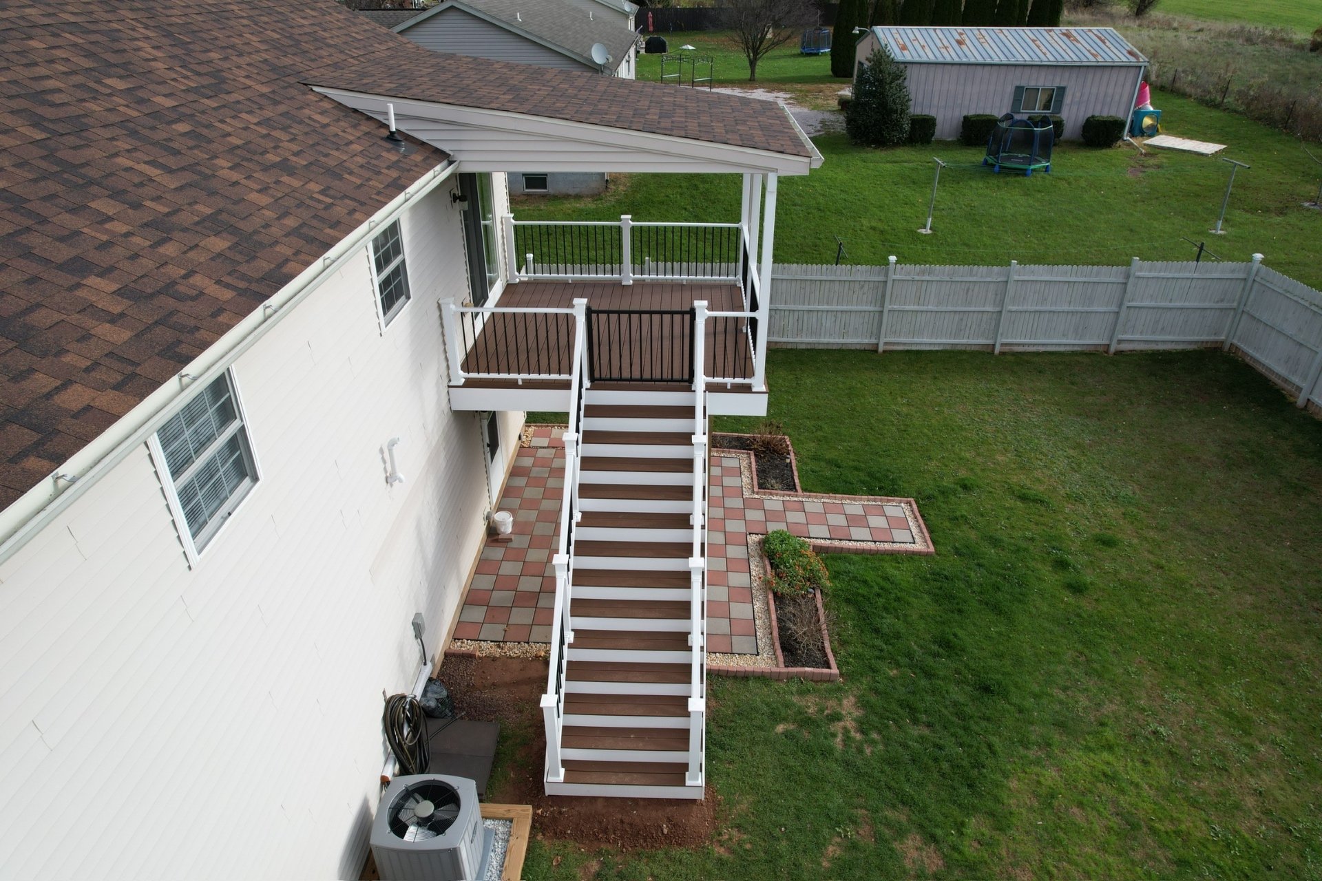 Aerial view of finished deck and staircase — Caliber Build · 03